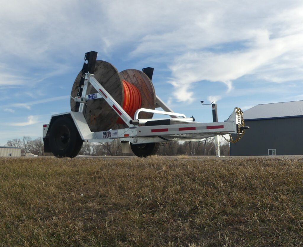 Larson LCT 7500 and LRT 8R Combo trailer for fiber optic and telecommunications work.